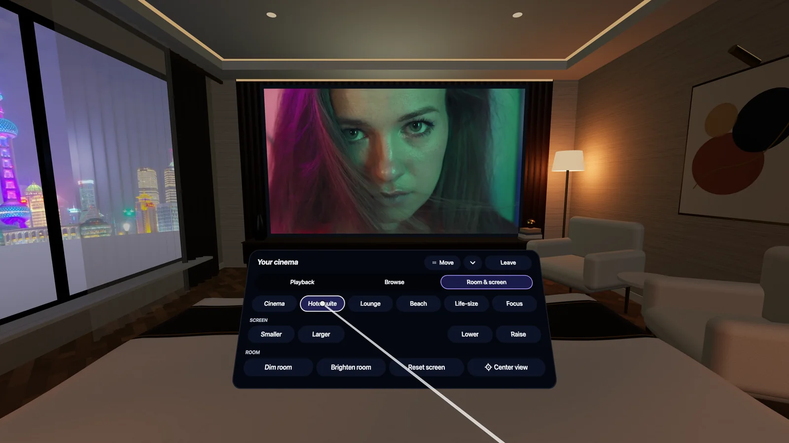A hotel suite with the big screen on the wall and the menu open