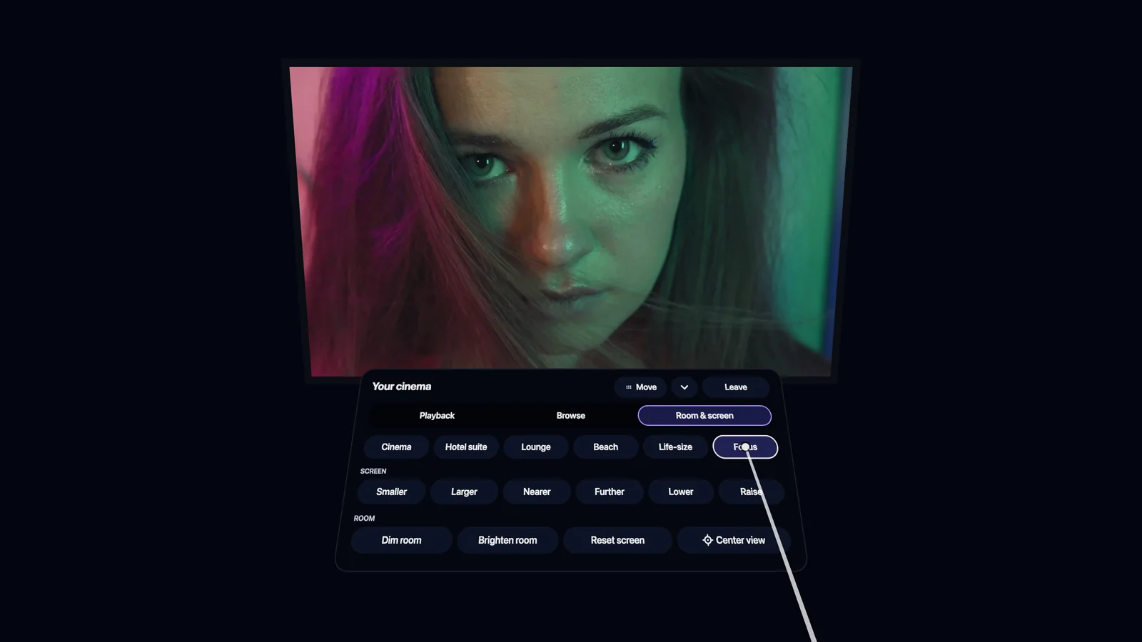 A large screen in a dark space with the menu open